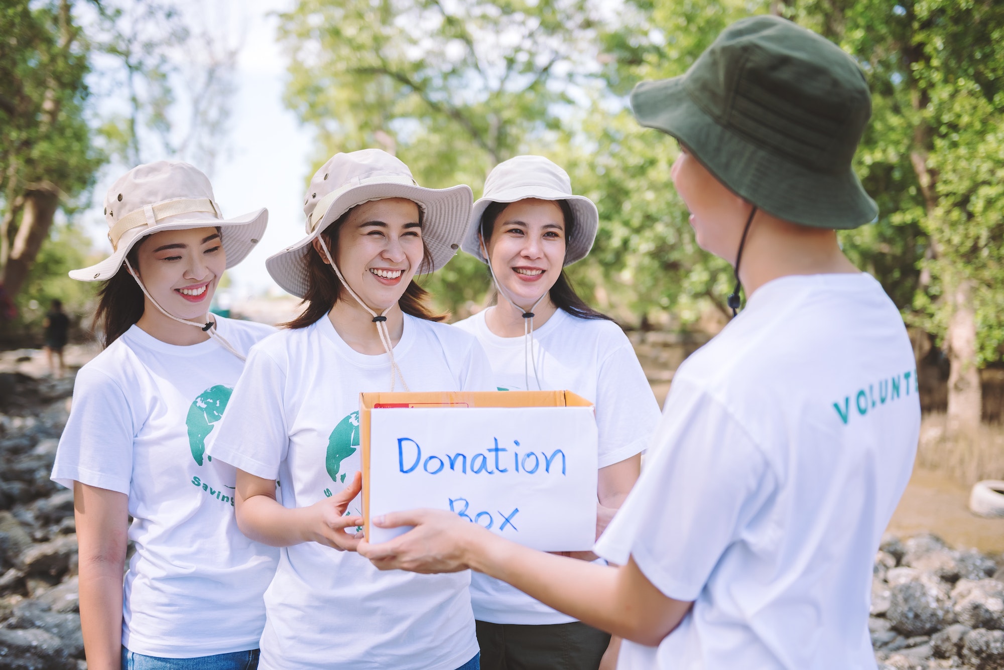 group-of-asian-diverse-people-volunteer-holding-a-donation-box-for-world-environment-day-campaign-.jpg